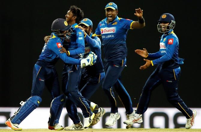 Sri Lanka's players celebrate the wicket of KL Rahul on Thursday