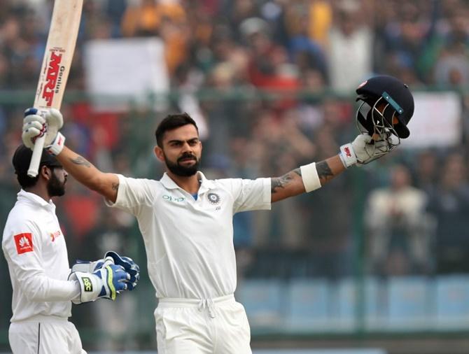  Virat Kohli celebrates his double century on Sunday