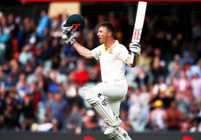 Australia's Shaun Marsh celebrates after reaching his century