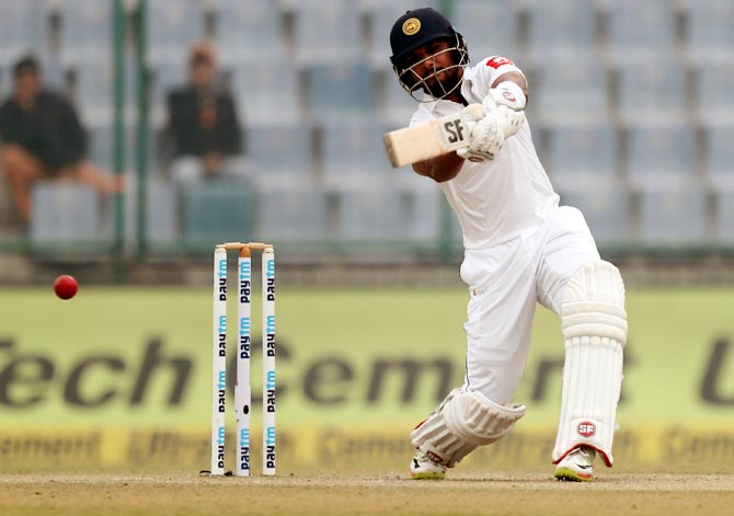 Dinesh Chandimal hits a boundary