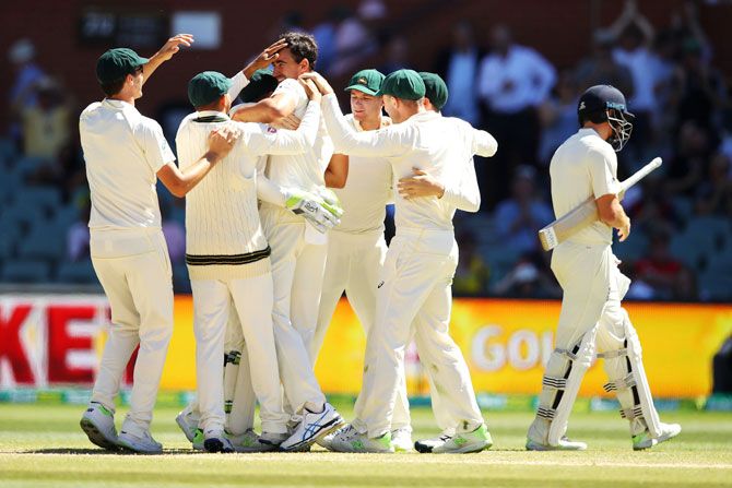 Australia players celebrate victory after Mitchell Starc had England's Jonny Bairstow clean bowled on Day 5 of the 2nd Ashes Test match at Adelaide Oval in Adelaide on Wednesday
