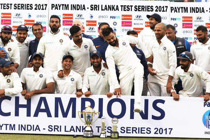 India captain Virat Kohli and members of the Indian cricket team at the post-match presentation ceremony after India drew the 3rd Test against Sri Lanka in New Delhi to claim the Test series 1-0