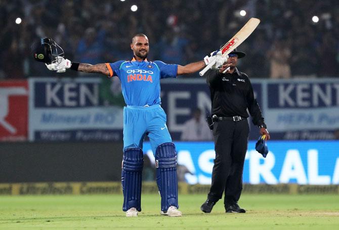 Shikhar Dhawan celebrates on completing his century 