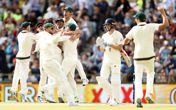 Australia celebrate after Pat Cummins claimed the final wicket of Chris Woakes to claim victory and the Ashes series on Day 5 of the 3rd Test at WACA in Perth on Monday