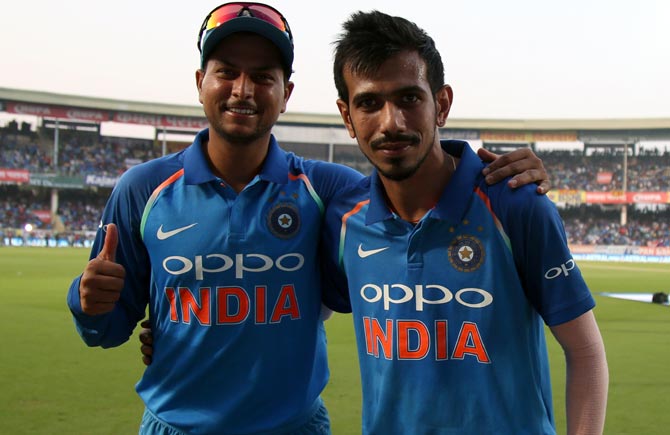 Yuzvendra Chahal, right, celebrates with Kuldeep Yadav