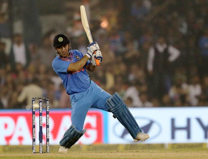 Mahendra Singh Dhoni plays his signature shot