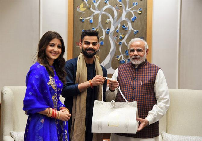 Anushka Sharma and Virat Kohli with PM Modi in New Delhi on Wednesday