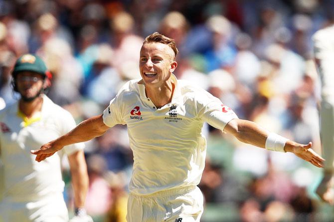 England paceman Tom Curran celebrates after dismissing Australia's Steve Smith