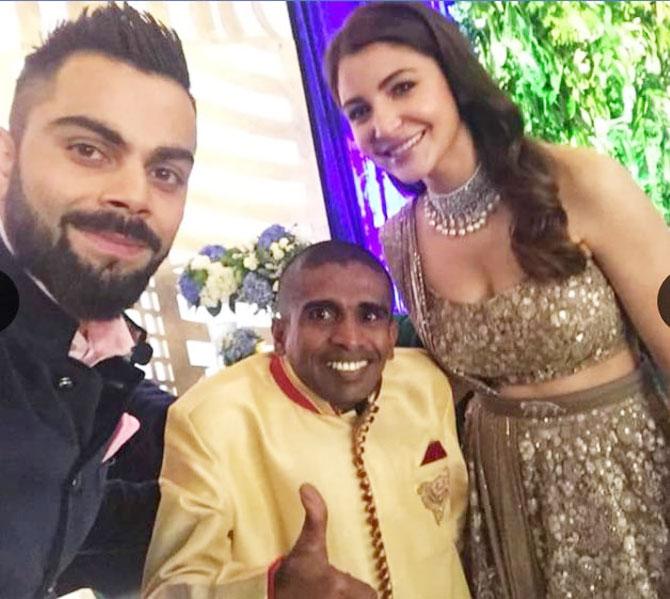 Gayan Senanayake is picture of happiness at the Virushka reception on Tuesday