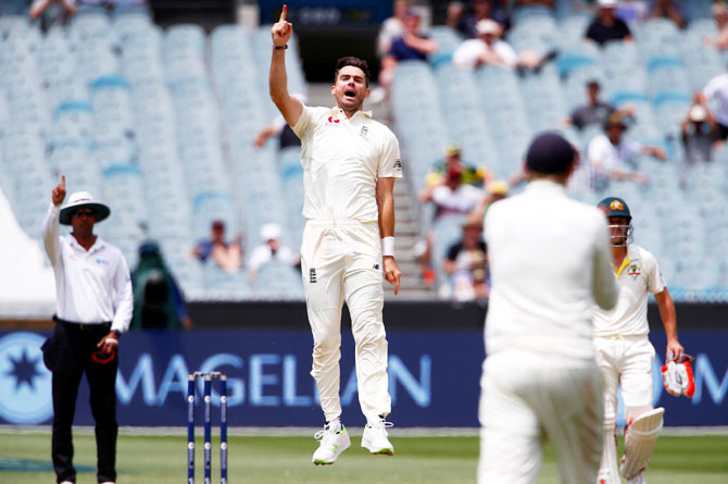 England's James Anderson celebrates on dismissing Australia's Usman Khawaja