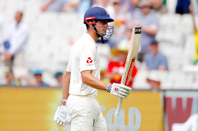 England's Alastair Cook walks off the ground at the end of England's first innings 