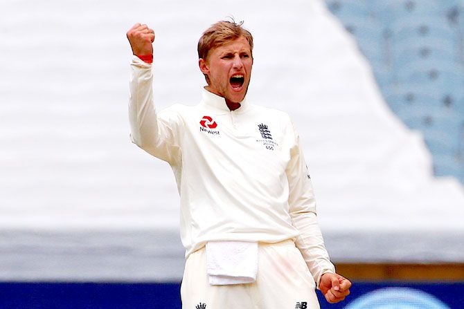 England's captain Joe Root reacts after dismissing Australia's David Warner during the fifth day of the fourth Ashes cricket Test at the Melbourne Cricket Ground in Melbourne on Saturday