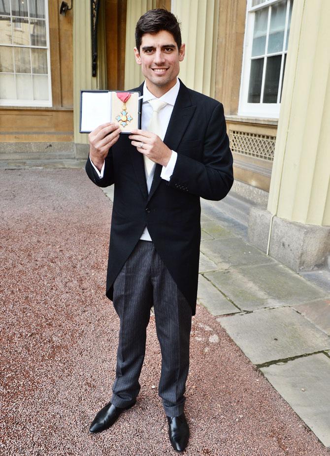 England's Alastair Cook poses for a photo after being awarded a CBE by the Prince of Wales at an Investiture ceremony at Buckingham Palace in London on Friday, February 3