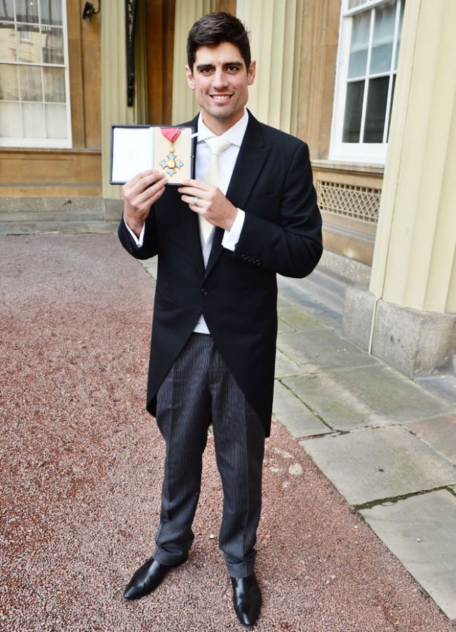 England's Alastair Cook poses for a photo after being awarded a CBE by the Prince of Wales at an Investiture ceremony at Buckingham Palace in London on Friday, February 3
