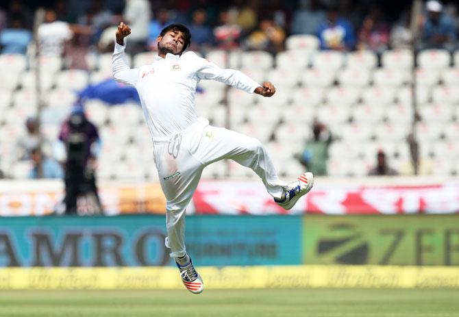 Mehdi Hasan celebrates after dismissing Cheteshwar Pujara