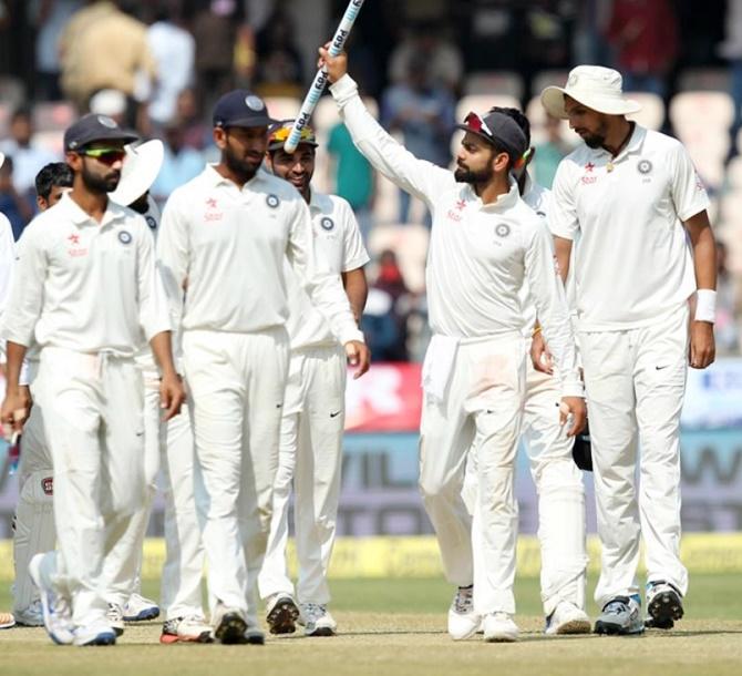 Virat Kohli leads his team after victory