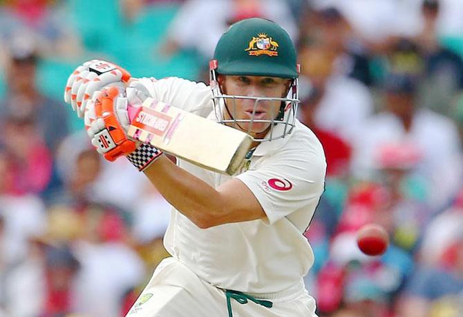 Australia's David Warner hits a shot en route his century