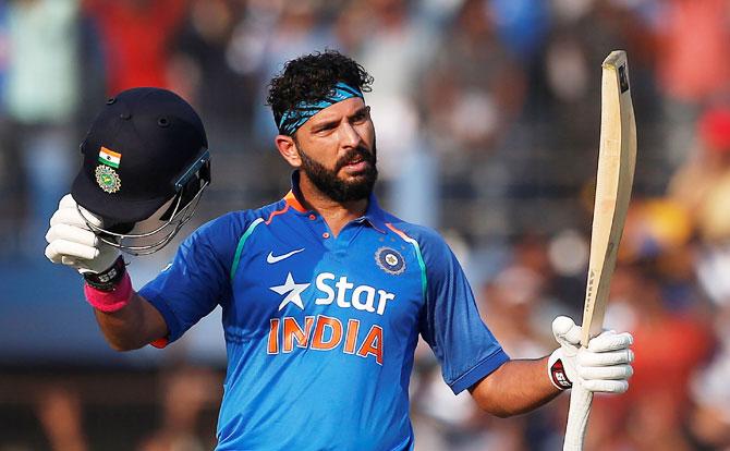 Yuvraj Singh celebrates on reaching his century against England during the 2nd ODI in Cuttack on Thursday