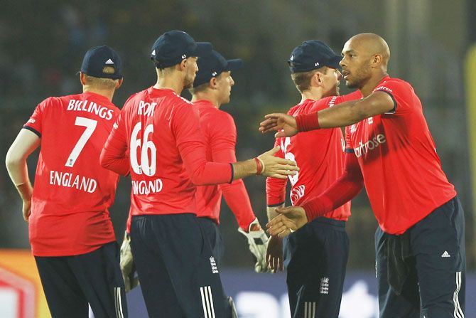 England's Tymal Mills celebrates the wicket of India's Hardik Pandya