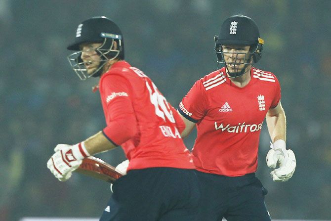 England captain Eoin Morgan and teammate Joe Root steal a run between wickets during the 1st T20 International against India at Green Park Stadium in Kanpur on Thursday