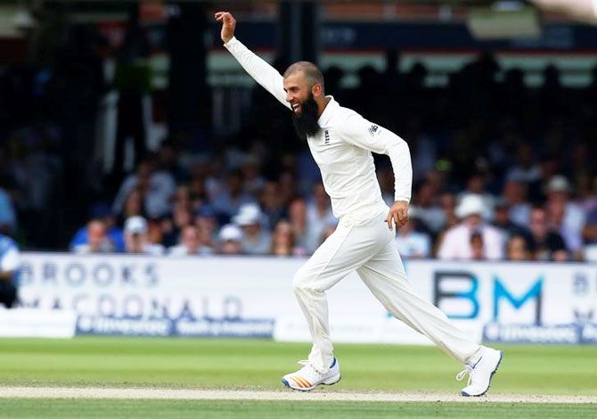 England's Moeen Ali celebrates taking the wicket of South Africa's Kagiso Rabada (not pictured) during the first Test at Lord's on Sunday