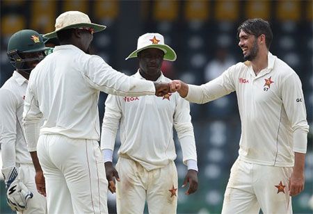 Zimbabwe captain Graeme Cramer celebrates a Sri Lankan wicket on Day 2 of the one-off Test in Colombo on Sunday
