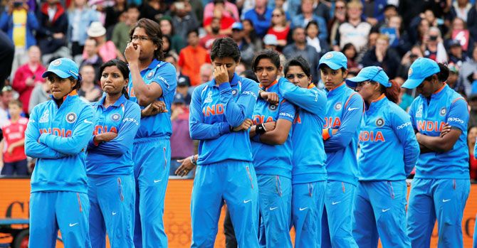 India players wear a dejected look at the presentation ceremony after their World Cup loss to England at Lord's on Sunday