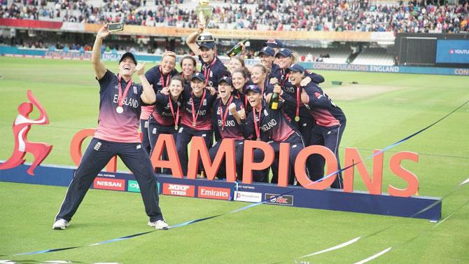 England players take a selfie with the World Cup trophy