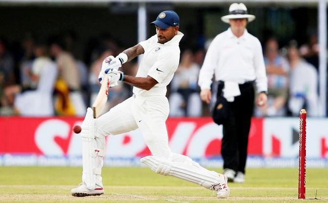 Shikhar Dhawan plays a shot en route his 190 on Day 1 of the Galle Test on Wednesday