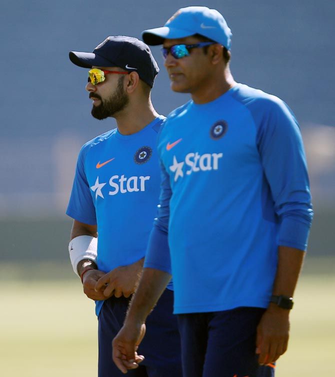 Captain Virat Kohli with Coach Anil Kumble during a practice session