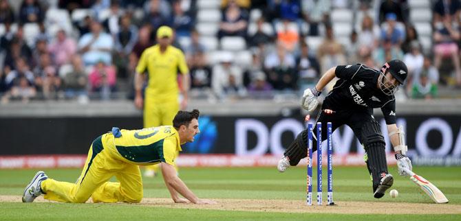 Kane Williamson is run out by Pat Cummins