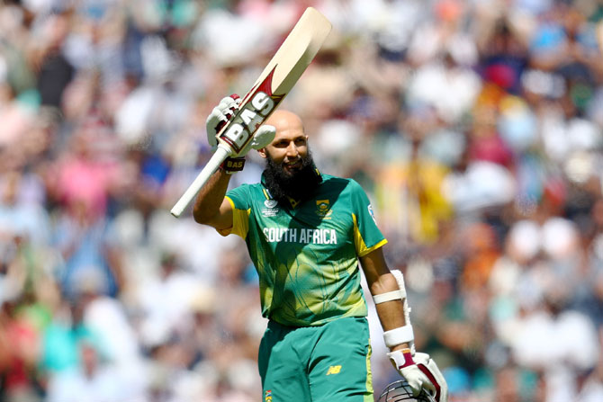 South Africa's Hashim Amla celebrates his century against Sri Lanka during the ICC Champions trophy cricket match at The Oval in London on Saturday
