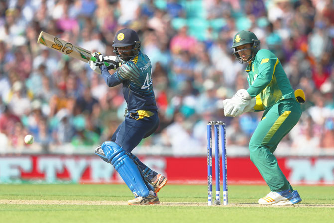 Sri Lanka's Upul Tharanga plays a cut short during his innings of 57