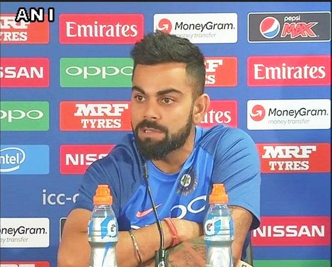 Virat Kohli's body language spoke as loud as his voice during the press conference on the eve of the India Champions Trophy opener against Pakistan