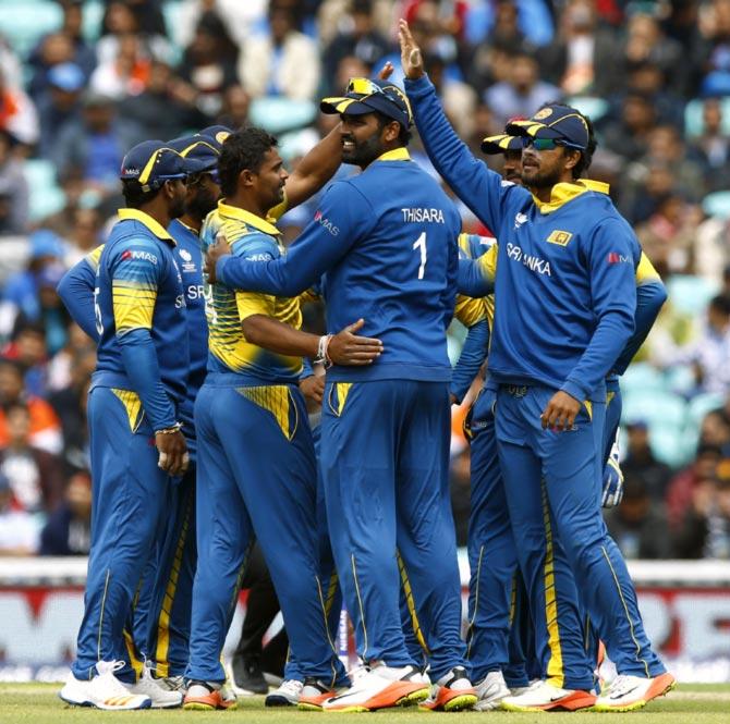 Sri Lanka players celebrate a wicket