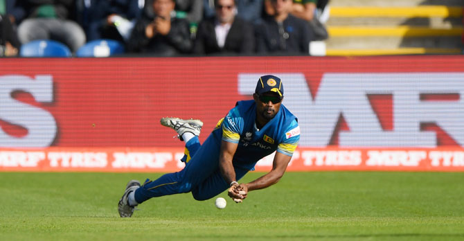 Sri Lanka's Seekugge Prasanna drops a catch to give Sarfraz Ahmed a life