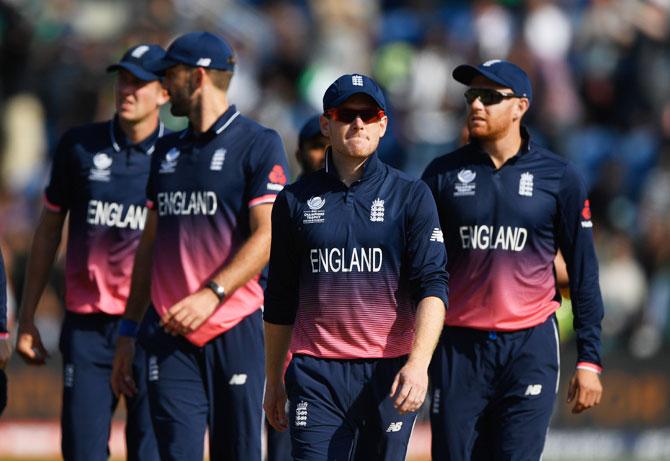 The England team wear a disappointed look after the semi-final