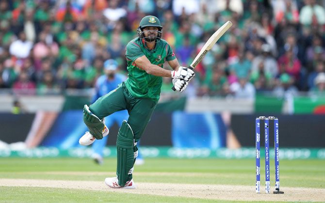 Bangladesh captain Mashrafe Mortaza goes all out as he bats en route his useful 30 off 25 balls lower down the  order