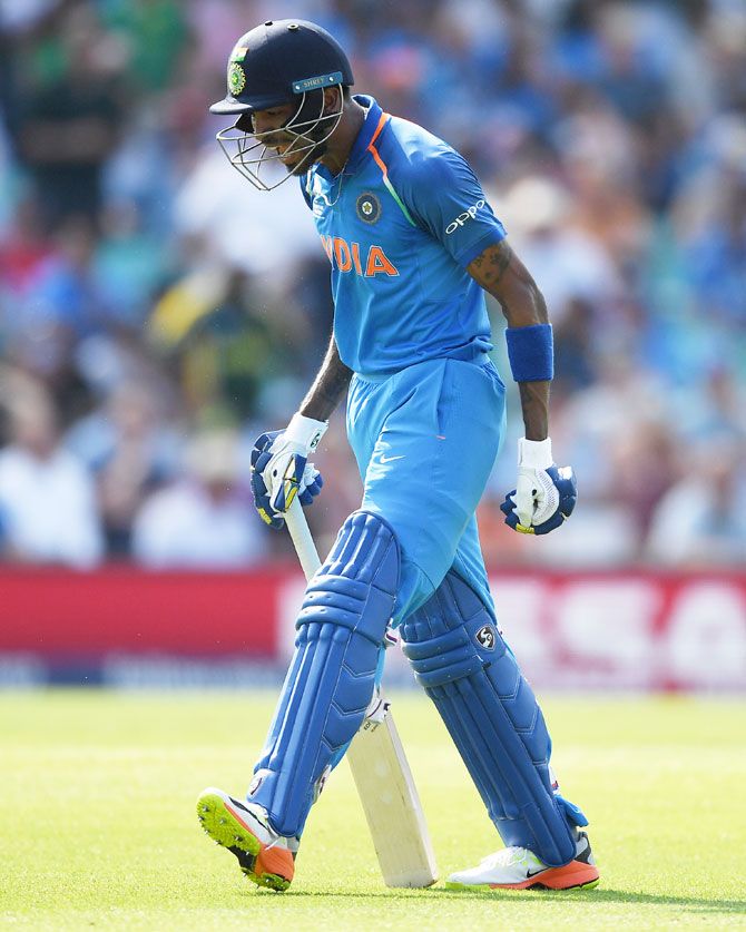Hardik Pandya of India shows his frustration after being run out 
