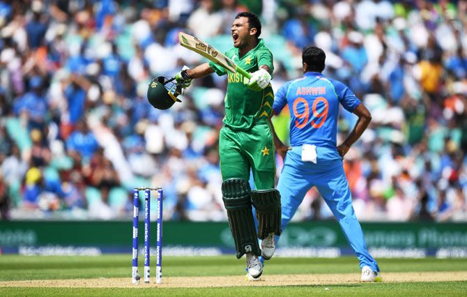 Pakistan's Fakhar Zaman celebrates reaching his century against India 