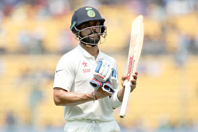 Virat Kohli wears a dejected look after being dismissed LBW through DRS