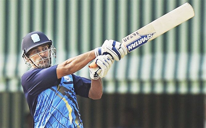 Jharkhand captain M S Dhoni in action during the Vijay Hazare Trophy against Jammu & Kashmir in Kalyani, West Bengal, on Monday
