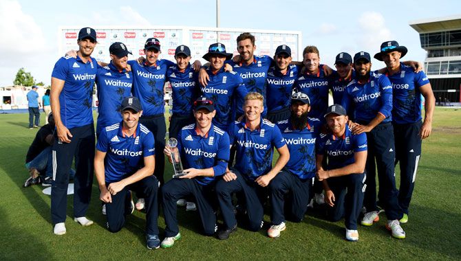 England celebrate with the series trophy after winning the 3rd One Day International against the West Indies on Thursday