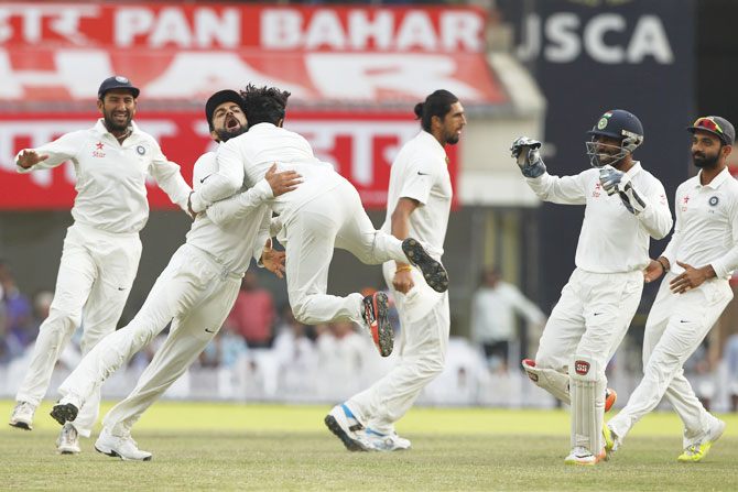 India captain Virat Kohli celebrates with Ravindra Jadeja after the latter dismissed Australia opener David Warner on Day 4 of the third Test at the JSCA International Stadium Complex in Ranchi on Sunday