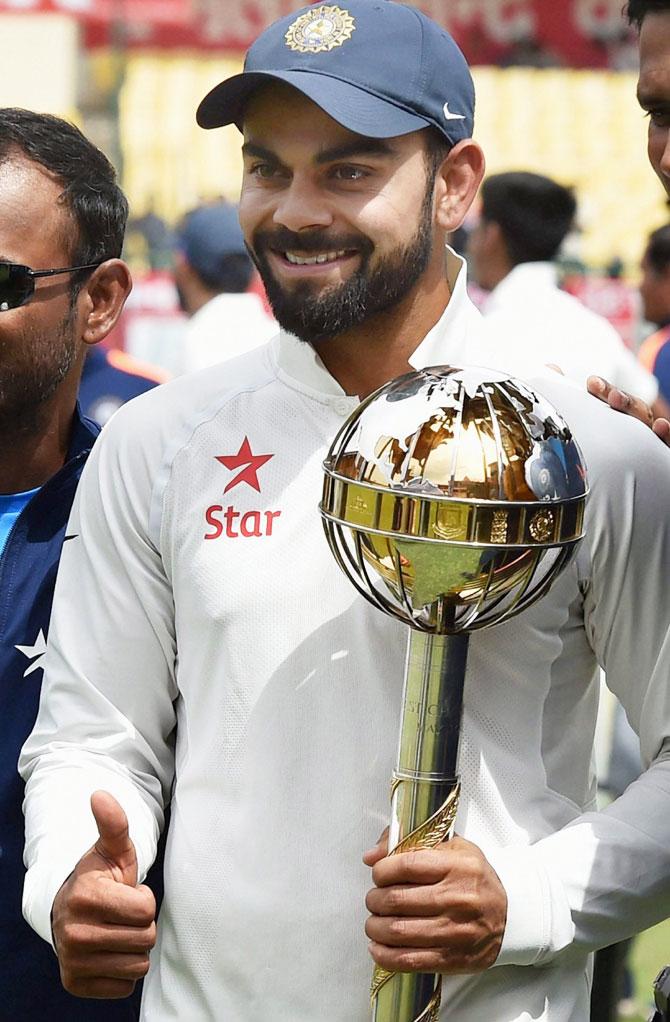 Virat Kohli with the ICC Test mace after winning the Dharamsala Test and finishing the season as World No 1