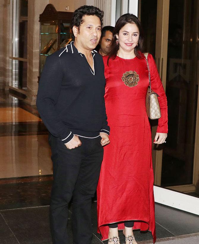 Sachin Tendulkar arrives with wife Anjali for the launch of his app '100MB' in Mumbai on Thursday