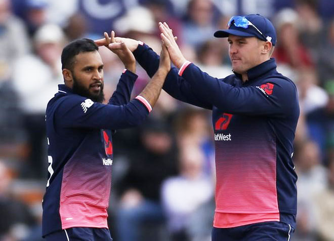 England's Adil Rashid and Jason Roy celebrate the wicket of Ireland's Niall O'Brien during their first One-day International at the Brightside County Ground, Bristol, on Friday
