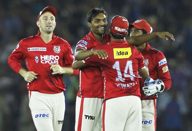 Kings XI Punjab bowler Sandeep Sharma celebrates with teammates after their win over Kolkata Knight Riders in Mohali on Tuesday