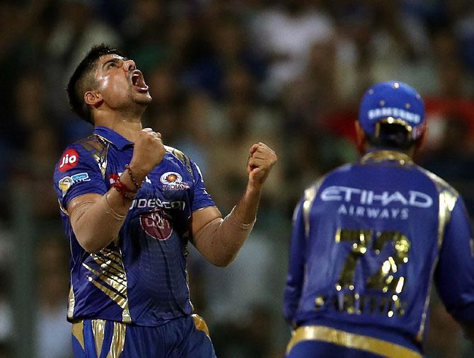 Karn Sharma celebrates the wicket of Ajinkya Rahane