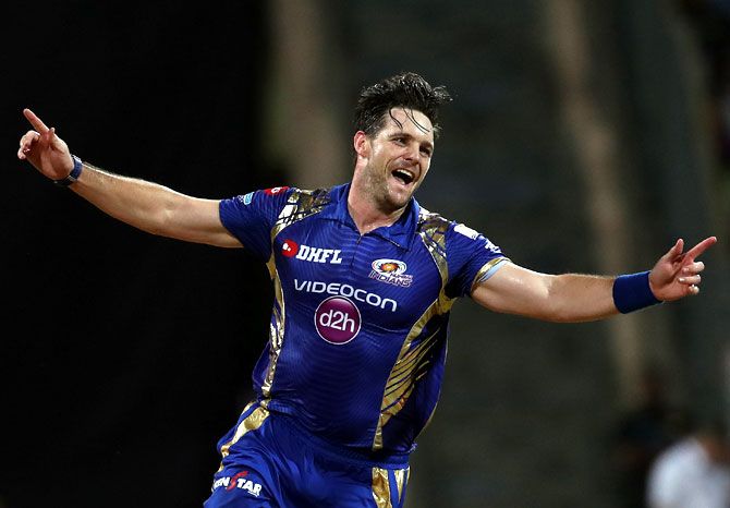 Mitchell McClenaghan celebrates after scalping the wicket of Rahul Tripathi